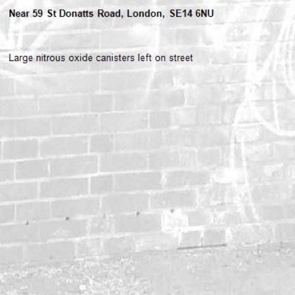 Large nitrous oxide canisters left on street -59 St Donatts Road, London, SE14 6NU