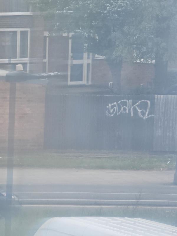 Tagging on the wooden fencing -128 Uxbridge Road, Southall, UB1 3DP