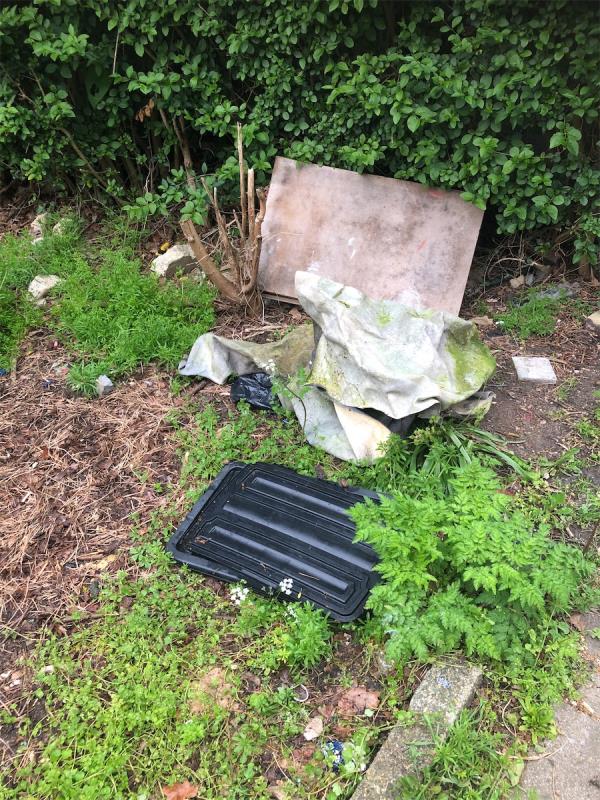 Junction of Moorside Road.. please clear flytip from grass area-52 Undershaw Road, Bromley, BR1 5EX