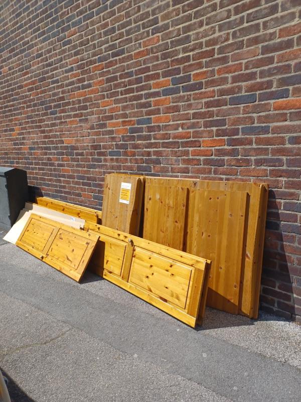 Pine wooden wardrobe panels on the public highway...No evidence found to whom had discarded them at the location found..enforcement sticker applied.-27 Biggerstaff Road, Stratford, London, E15 2JR