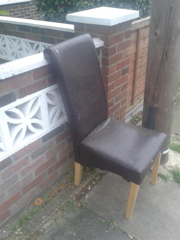 Please clear a flytipped chair-36 Sedgehill Road, Bellingham, London, SE6 3QT