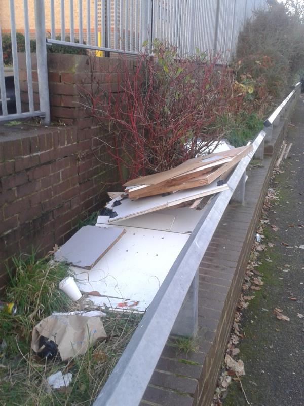 Capstone Road. Please clear a large amount of wood From the Coop shrub bed-25 Capstone Road, Bromley, BR1 5NA