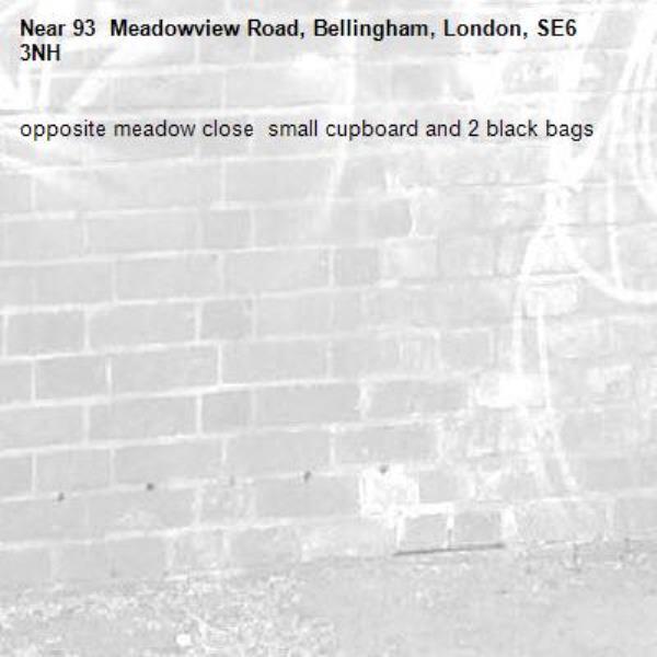 opposite meadow close  small cupboard and 2 black bags  -93  Meadowview Road, Bellingham, London, SE6 3NH