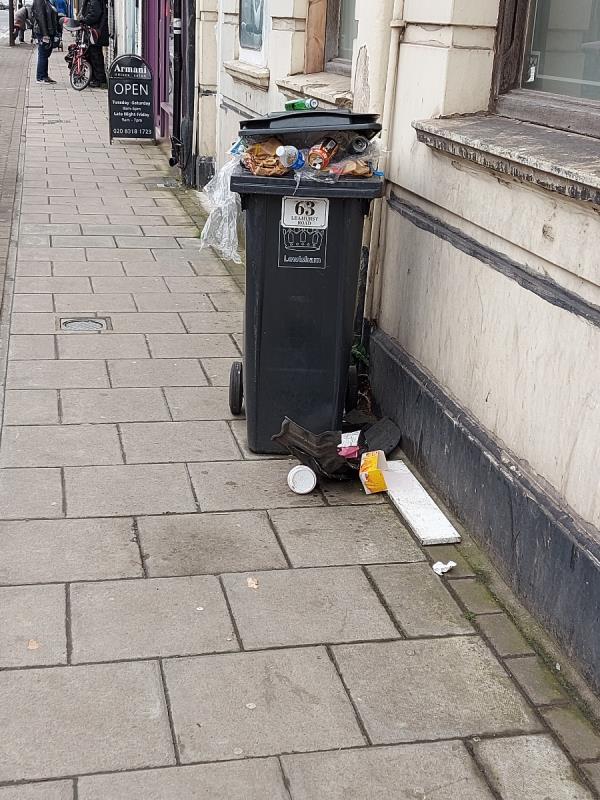 A black bin from Leahust Road has been stolen and dumped on Hither Green Lane for the last two weeks, and it is overflowing with rubbish all over the pavement. I do not understand why the Road sweepers have not reported this issue.-Hither Green Lane, Hither Green, London