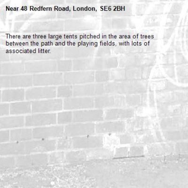 There are three large tents pitched in the area of trees between the path and the playing fields, with lots of associated litter.-48 Redfern Road, London, SE6 2BH