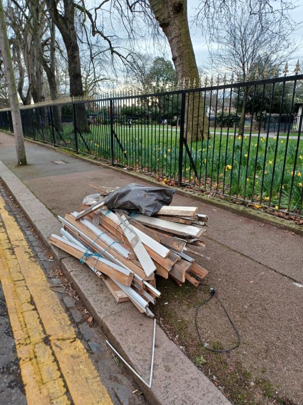 A lage stack of timber frames  panels ,wood dumped -9 Woodhouse Grove, Manor Park, London, E12 6SR