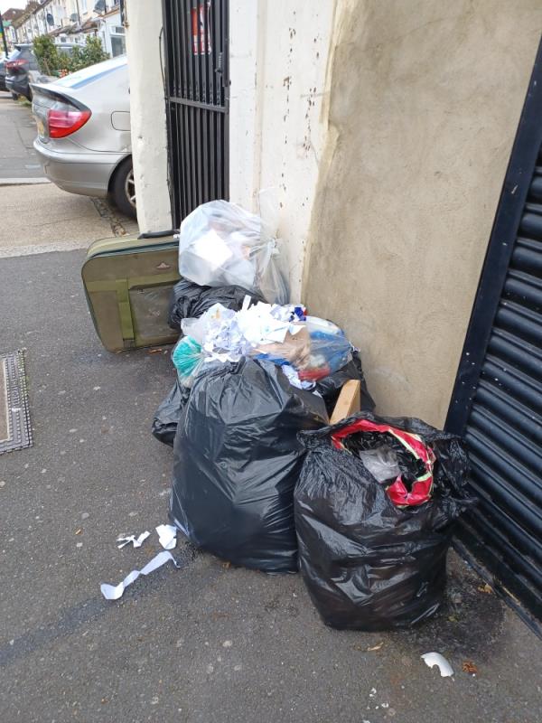 Bags of household waste fly tipped at 236 Boleyn Road, E7. -236 Boleyn Road, Forest Gate, London, E7 9QJ