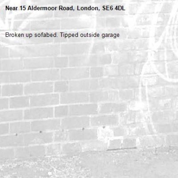 Broken up sofabed. Tipped outside garage-15 Aldermoor Road, London, SE6 4DL