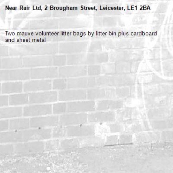 Two mauve volunteer litter bags by litter bin plus cardboard and sheet metal -Rair Ltd, 2 Brougham Street, Leicester, LE1 2BA