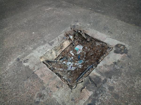We have made a delivery to a company called Sipak, when we arrived we have driven over a manhole cover (see attached) which has caved in and is very close to a public footpath with it being on a industiral estate. 

What would be the steps to get this fixed.

Thanks, -17 Wheatsheaf Way, Freemen, LE2 6EQ, England, United Kingdom