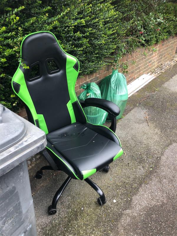 70’. Please clear a dumped chair-19 Henry Cooper Way, Grove Park, London, SE9 4JF
