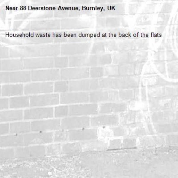 Household waste has been dumped at the back of the flats-88 Deerstone Avenue, Burnley, UK