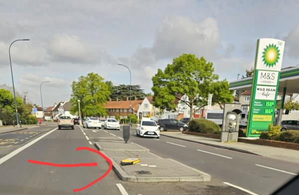 Pedestrian island sign has been knocked over and needs replacing -408 Bromley Road, London, BR1 4PL