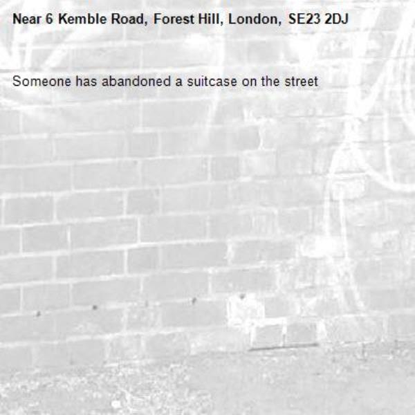 Someone has abandoned a suitcase on the street-6 Kemble Road, Forest Hill, London, SE23 2DJ
