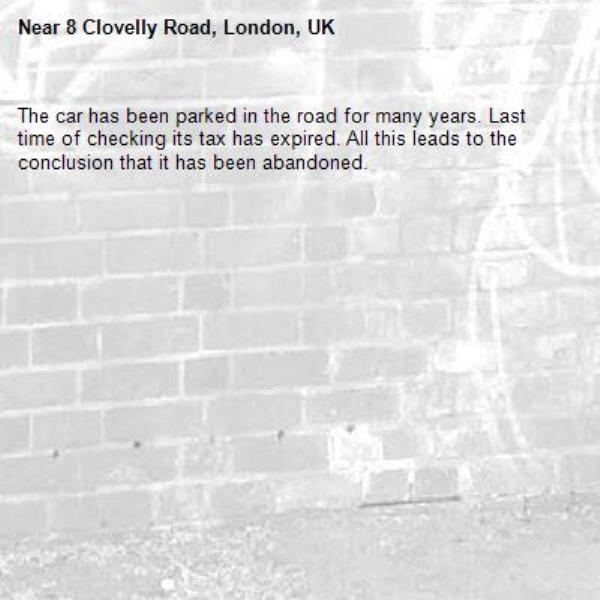 The car has been parked in the road for many years. Last time of checking its tax has expired. All this leads to the conclusion that it has been abandoned.-8 Clovelly Road, London, UK