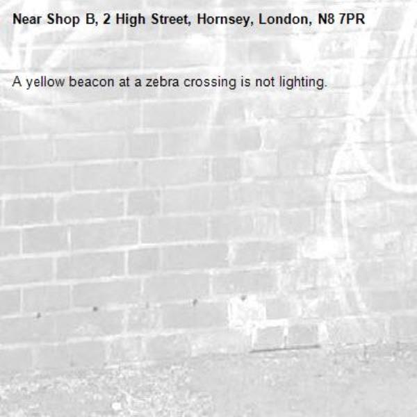 A yellow beacon at a zebra crossing is not lighting.-Shop B, 2 High Street, Hornsey, London, N8 7PR