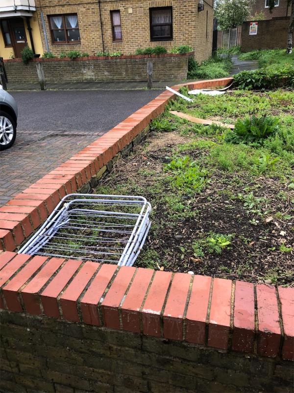 Please. Clear flytip from top of planter-Hoover House, Beckenham Hill Road, Bellingham, Bromley, SE6 3PP