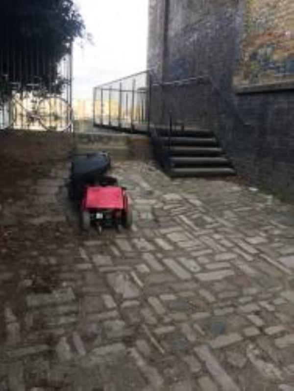 In Alleyway. Please clear kids trolley-100 Watergate St, London SE8 3HH, UK
