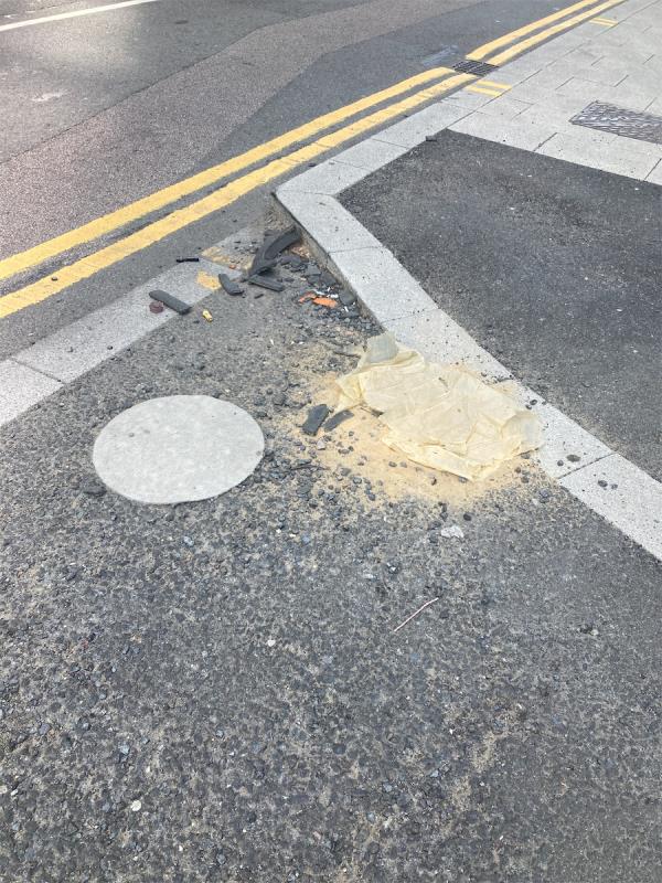 Sand and debris of a traffic cone.-Westfield Avenue, Stratford, London
