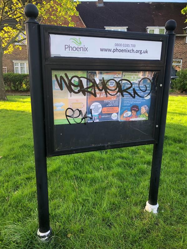 Opposite Evans Road. Remove graffiti from notice board-174 Waters Road, London, SE6 1UQ