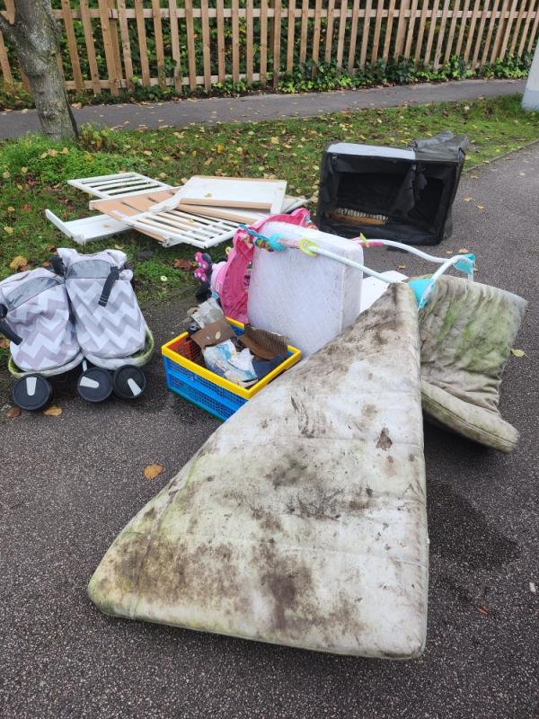 Various items left on footpath opposite Coley Primary School on the corner of Brook Street West-50 Brook Street West, RG1 6BB, England, United Kingdom