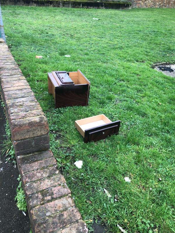 90-100.. please clear a wooden unit from grass area-92 Courthill Road, Hither Green, London, SE13 6HA