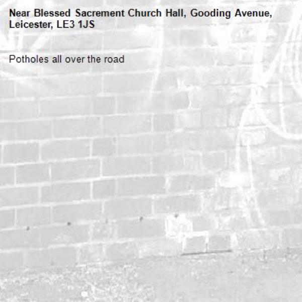 Potholes all over the road -Blessed Sacrement Church Hall, Gooding Avenue, Leicester, LE3 1JS