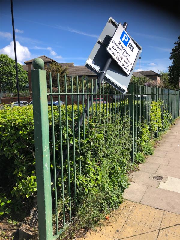 Parking sign at Abinger Grove entrance is leaning over-Marine Tower, Abinger Grove, London, SE8 5UY