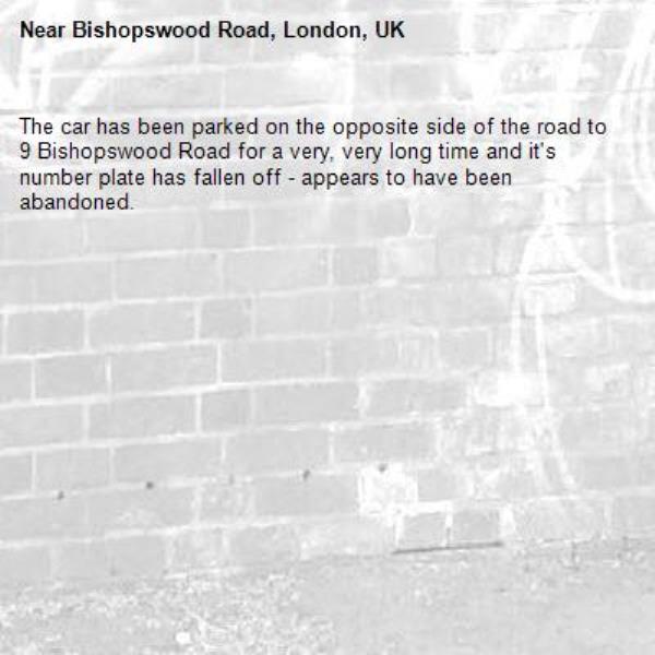 The car has been parked on the opposite side of the road to 9 Bishopswood Road for a very, very long time and it's number plate has fallen off - appears to have been abandoned.-Bishopswood Road, London, UK