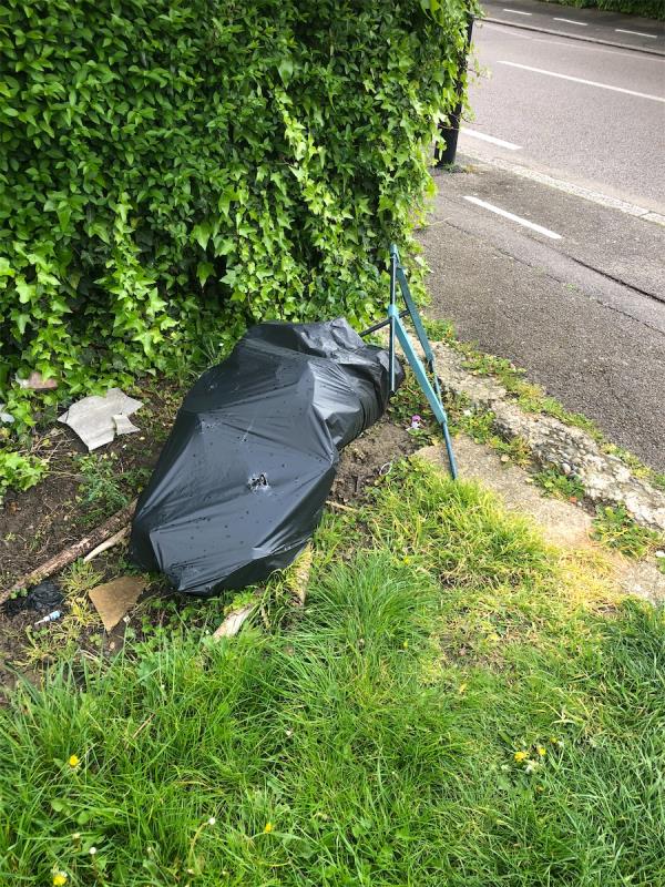 Junction of Keedonwood Road. Please clear flytip from grass area-13 Rangefield Road, Bromley, BR1 4RR