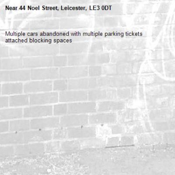 Multiple cars abandoned with multiple parking tickets attached blocking spaces-44 Noel Street, Leicester, LE3 0DT