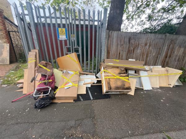 Kitchen units, cardboard boxes, laminate flooring, black bags filled with small pieces of laminate flooring and shoppingtrolleys to be removed please-165 Laleham Road, London, SE6 2AE