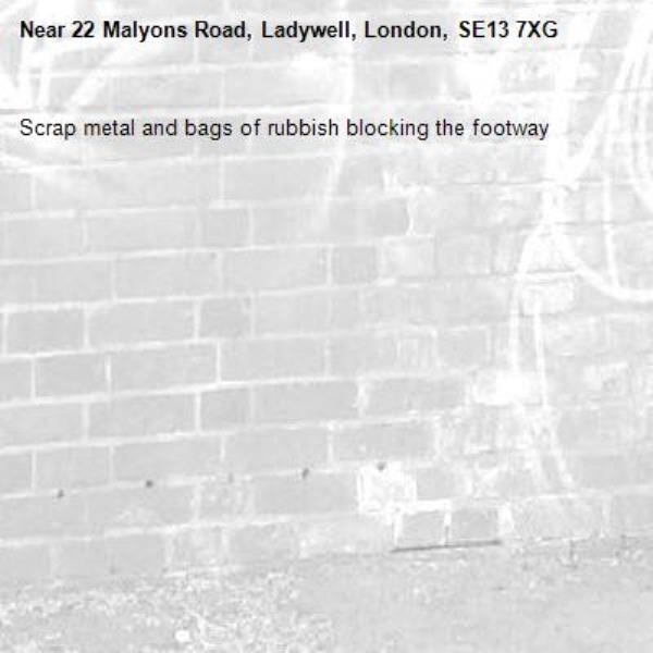 Scrap metal and bags of rubbish blocking the footway -22 Malyons Road, Ladywell, London, SE13 7XG