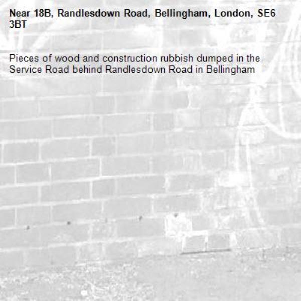 Pieces of wood and construction rubbish dumped in the Service Road behind Randlesdown Road in Bellingham -18B, Randlesdown Road, Bellingham, London, SE6 3BT