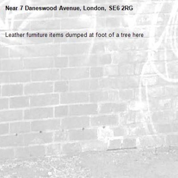 Leather furniture items dumped at foot of a tree here-7 Daneswood Avenue, London, SE6 2RG