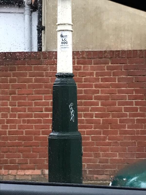 White felt pen tag is located on a lamp column opposite 46 Lavington Road W13-46 Lavington Road, West Ealing, W13 9LS