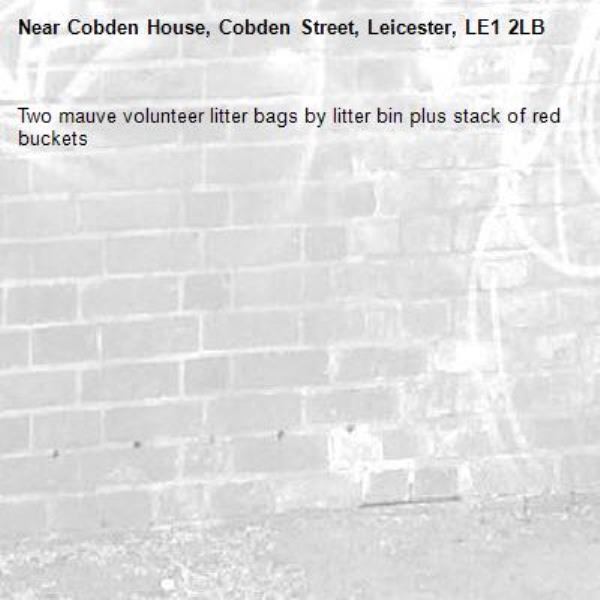 Two mauve volunteer litter bags by litter bin plus stack of red buckets -Cobden House, Cobden Street, Leicester, LE1 2LB