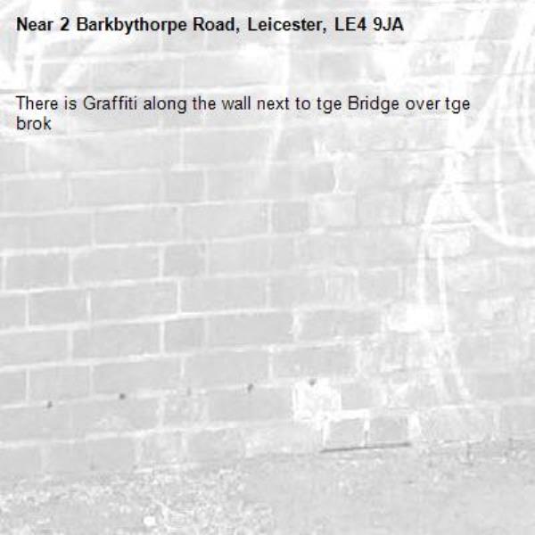 There is Graffiti along the wall next to tge Bridge over tge brok-2 Barkbythorpe Road, Leicester, LE4 9JA