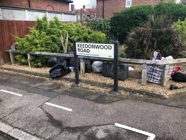 Junction of Glenbow Road. Please clear a large amount of bags from corner plot-45 Keedonwood Road, Bromley, BR1 4QJ