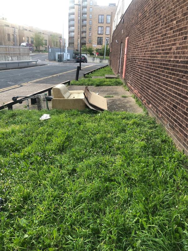 Discarded sofa, shopping trolley and other material-Dulux Decorator Centre, J P Mcdougall Ltd, 15 Thornham Grove, Stratford, London, E15 1DN