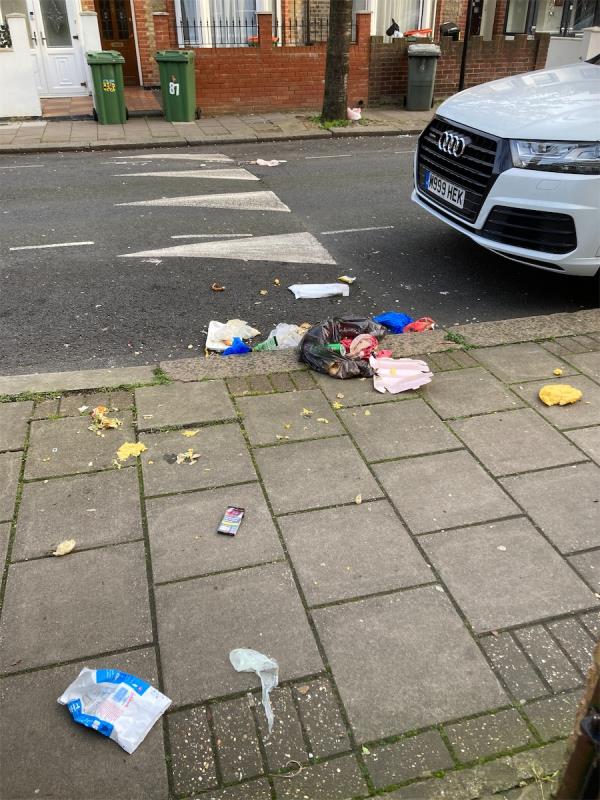 Bin men left spilled refuse bag outside no 86 sherrard rd-88 Sherrard Road, Forest Gate, London, E7 8DW
