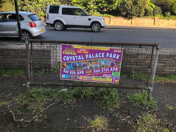 Remove flypostering from railings  by former toilets-315A, Sydenham Road, London, SE26 5EW