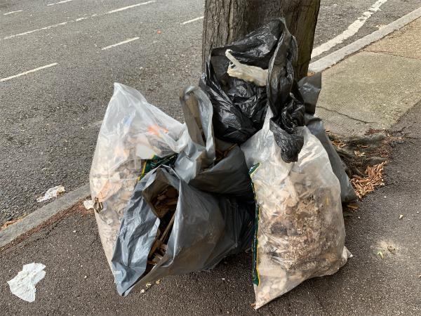 Building material dumped next to tree. 6 Barwick Road is having building works right now.-2 Barwick Road, Forest Gate, London, E7 0JE