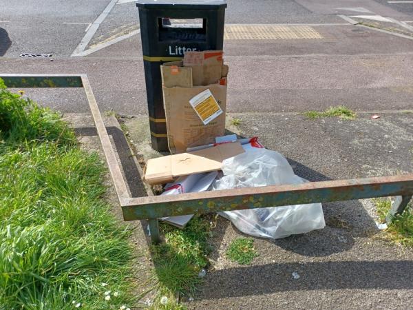 Cardboard boxes fly tipped next to LBN litter bin at Beaumont, E13. -1 Surrey Street, Plaistow, London, E13 8RN