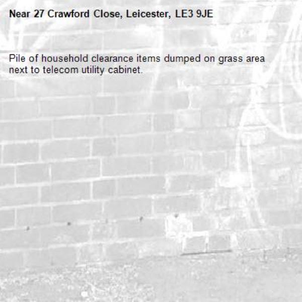 Pile of household clearance items dumped on grass area next to telecom utility cabinet.-27 Crawford Close, Leicester, LE3 9JE