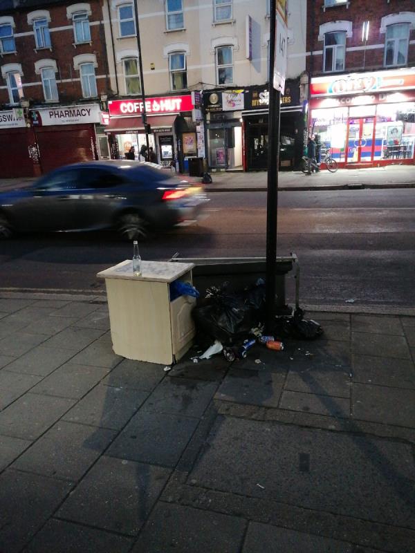 The flats have dumped house hold furniture out in the pavement again. -Mirage, 301 Barking Road, East Ham, London, E6 1LB