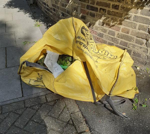 Builder's bag full of garden waste dumped on corner of Prince's Rise / Lewisham Hill.-24 Princes Rise, Blackheath, London, SE13 7PP
