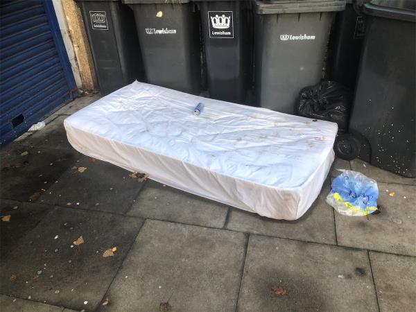 Outside Corals. Please clear a mattress -348 Verdant Lane, London, SE6 1TP
