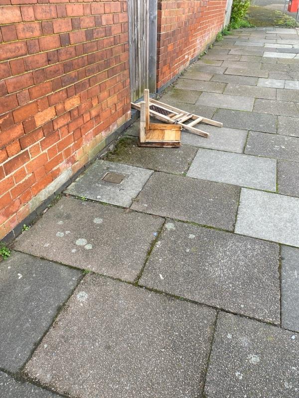 Broken chair dumped on path-70 Haddenham Road, Leicester, LE3 2BF