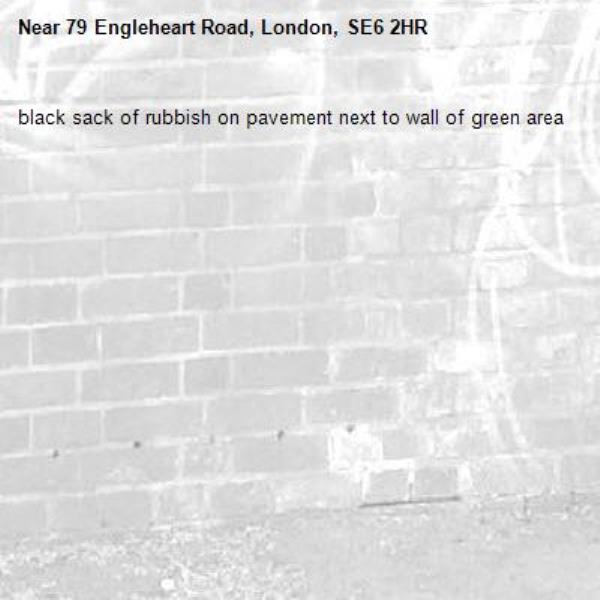 black sack of rubbish on pavement next to wall of green area-79 Engleheart Road, London, SE6 2HR